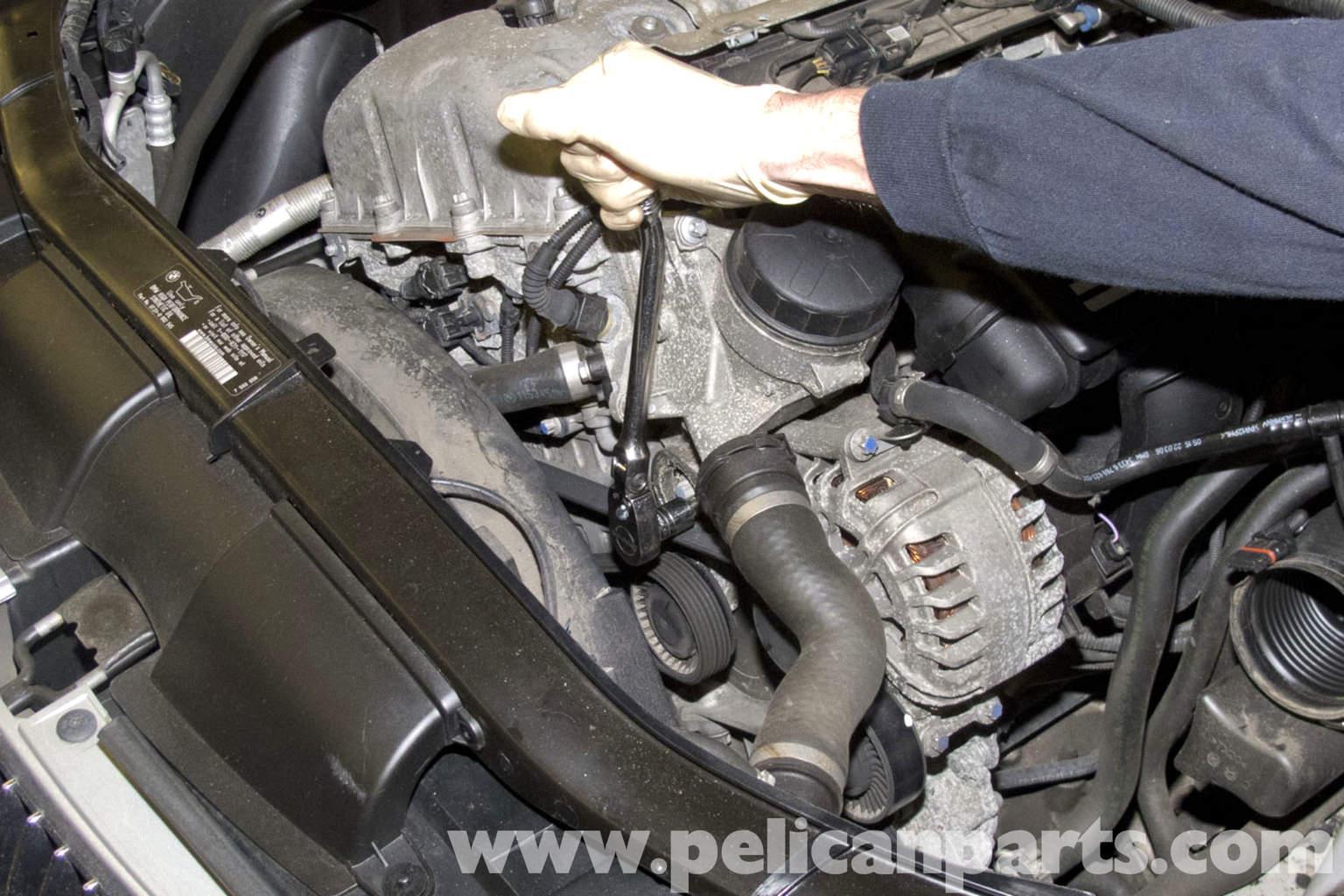 натяжения ремню грм e90